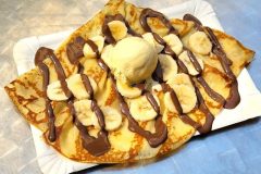 Banana and Nutella crepe topped with vanilla ice cream at Disco Crêpes in Paris.